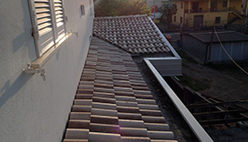 Impermeabilizzazione tetto e posa in opera di tegole in cemento Sfinge
