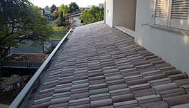 Impermeabilizzazione tetto e posa in opera di tegole in cemento Sfinge
